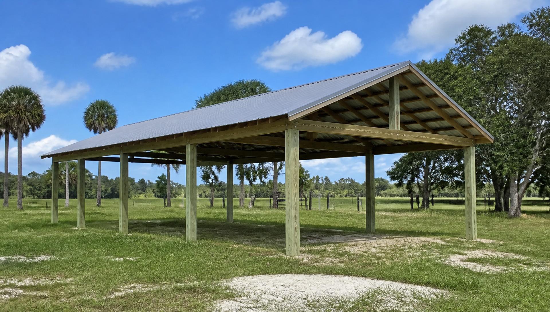 Open Florida pole barn with metal roof and wood posts