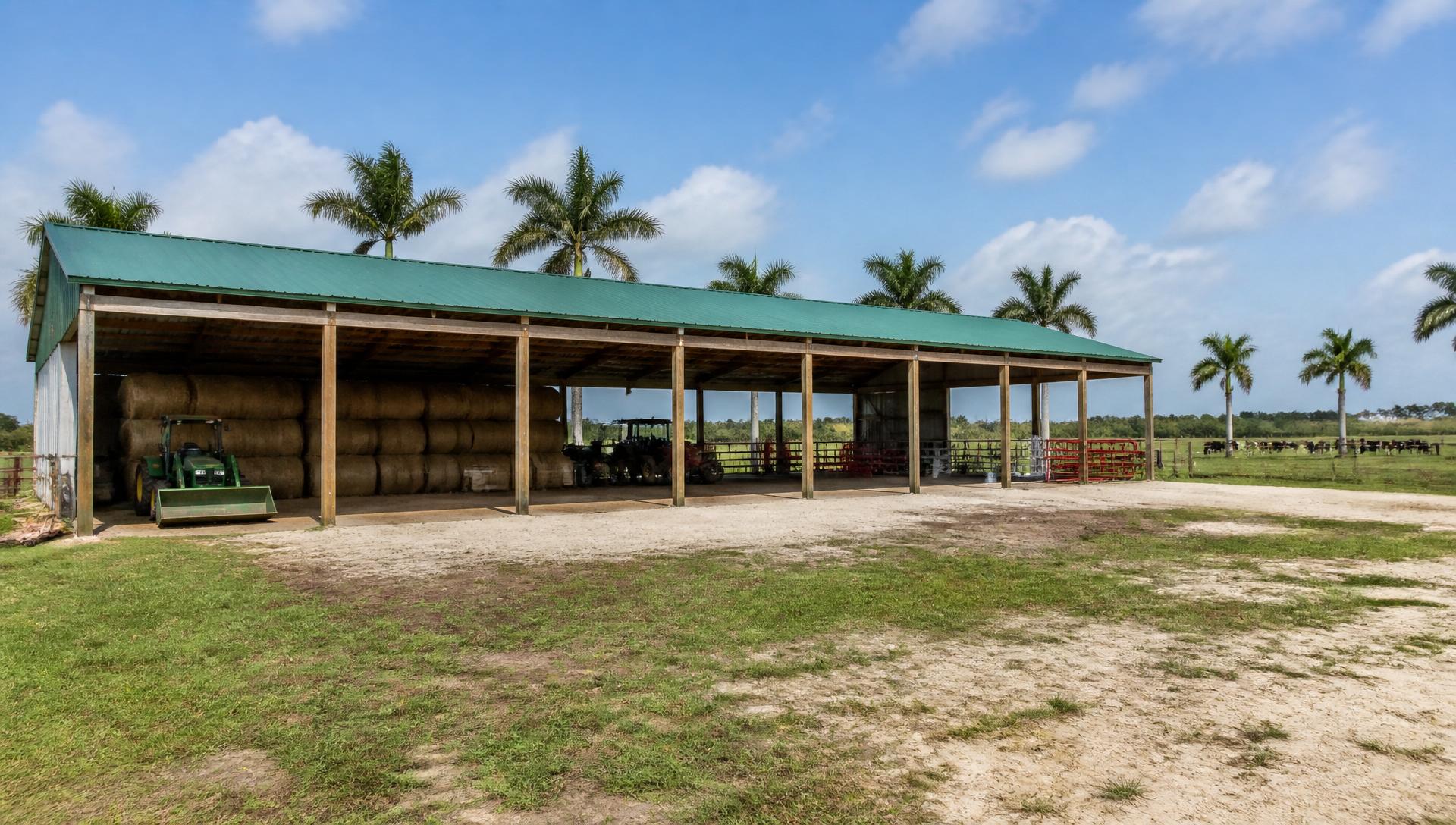 Long open hay and equipment barn on a working Florida cattle ranch